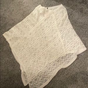 White Poncho never worn
